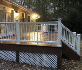 Albrightsville, PA Trex Decking in "Saddle" w/ Trex White Crown Railing and White Balusters Trex composite decking with white vinyl railing built in Albrightsville, PA.